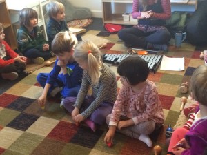 Spinning dreidels while everyone else sings "Dreidel, dreidel, dreidel..."