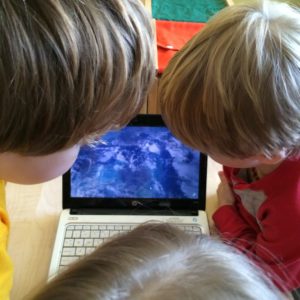 Older students watching a lifestream from a NASA satellite. While interested, they weren't terribly impressed!